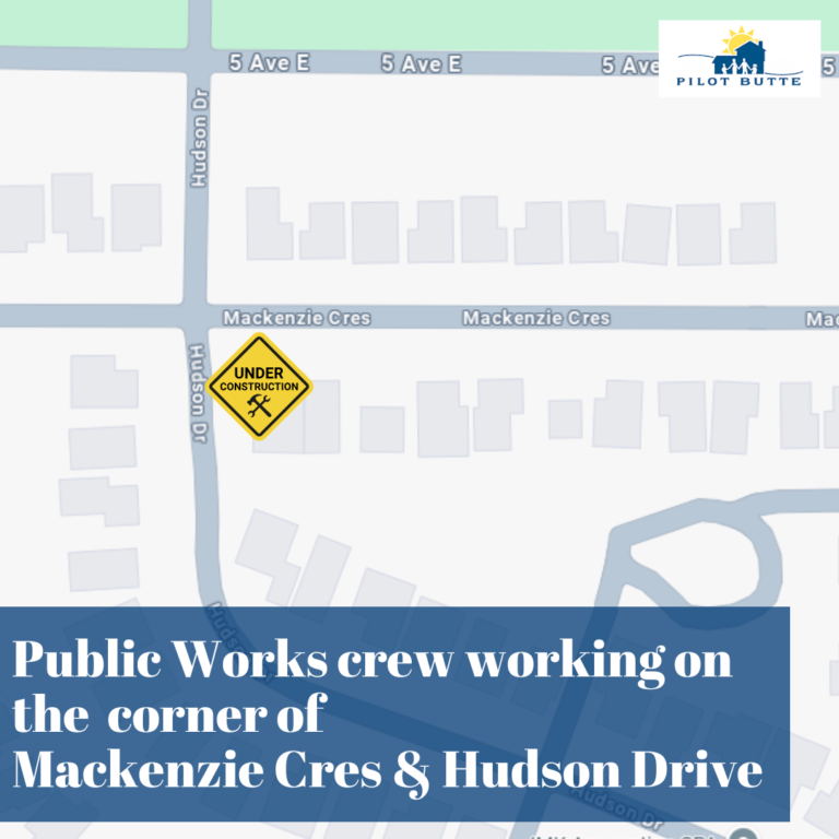 Public Works crew working on the corner of Mackenzie Cres Hudson Drive